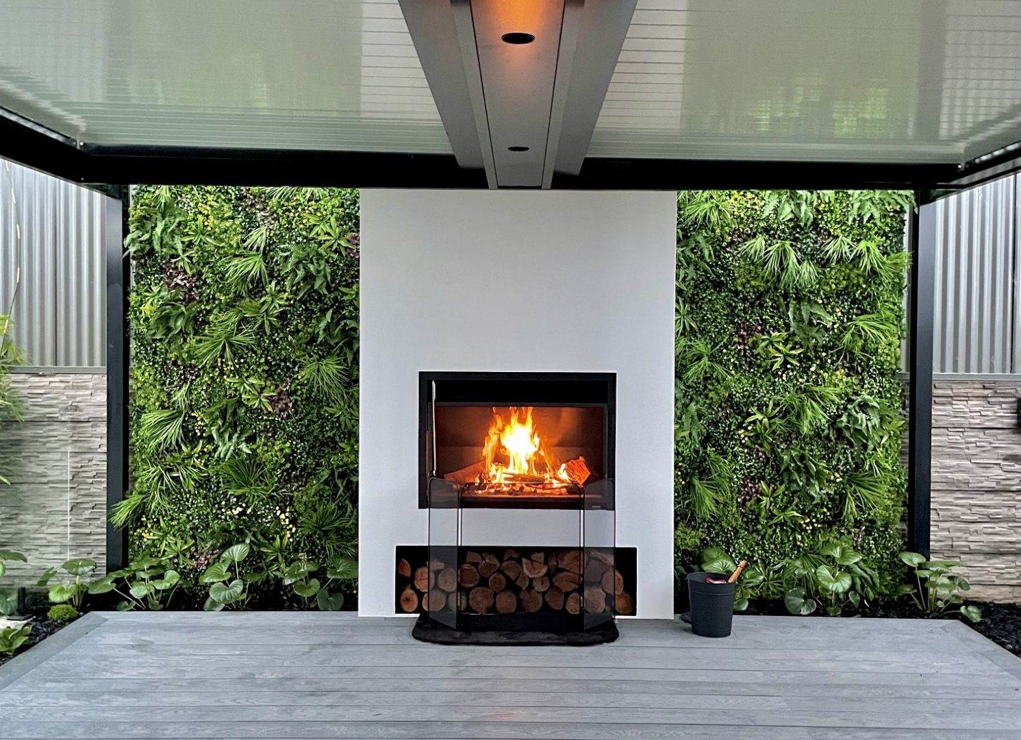 Eclipse - Eclipse louvre roof closed over an outdoor entertaining area with fireplace in Moana, South Australia