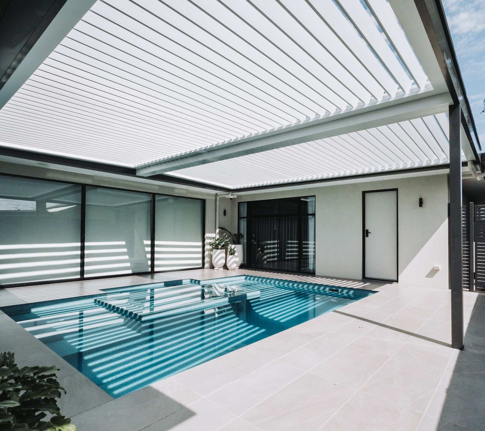 Eclipse - Eclipse louvre Adelaide over a pool